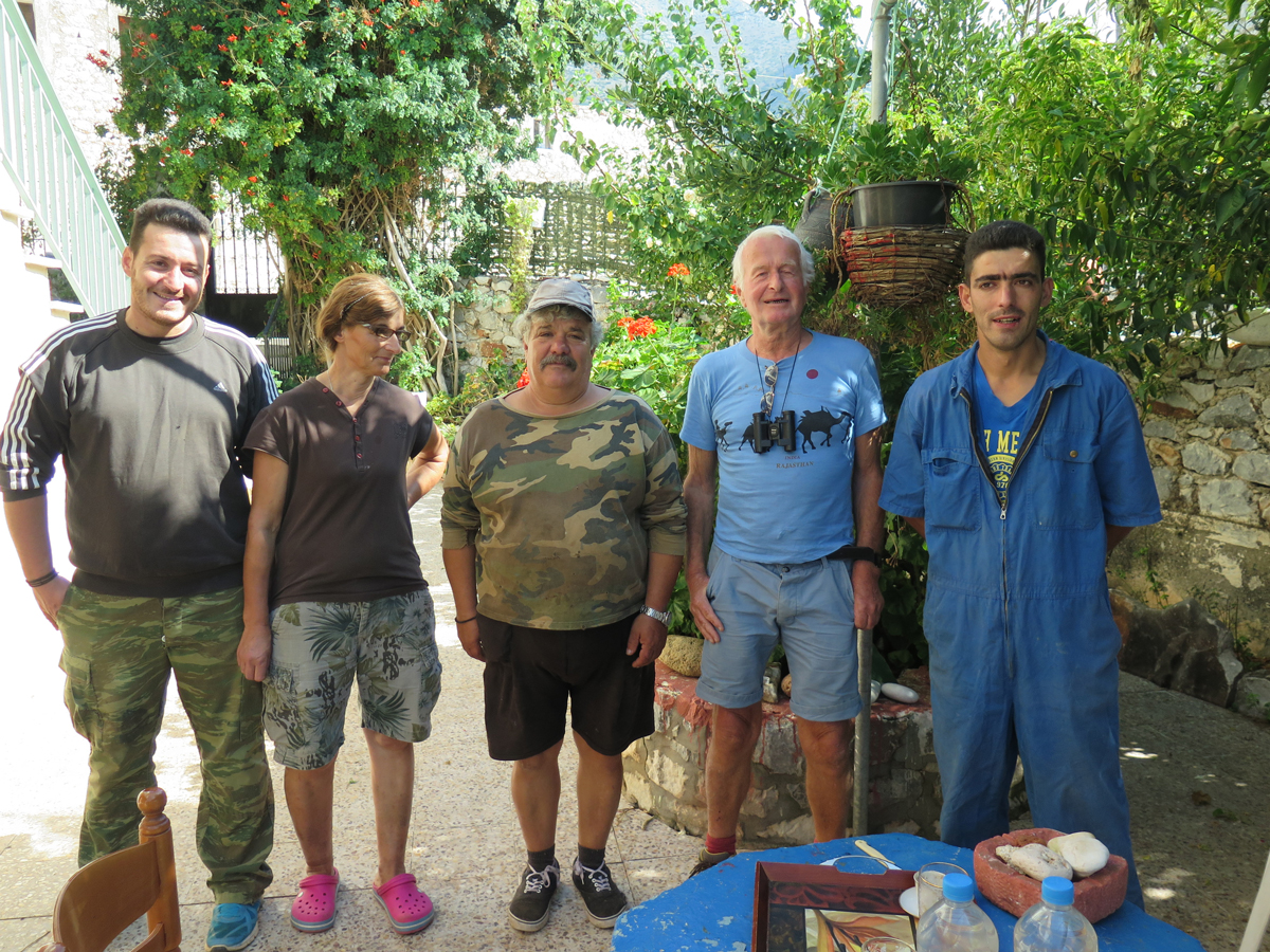 With the hospitable retired sailor and his family in Charia.