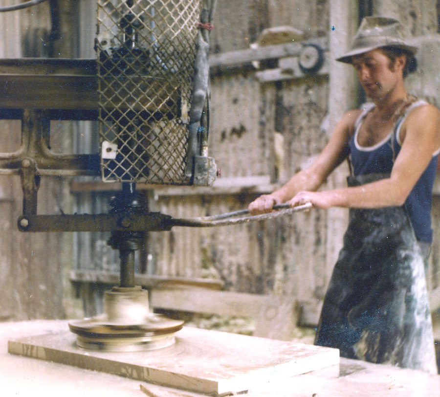 Ilay using the rotating abrasives of a 'Jenny Lind' to polish a hearth at St Aldhelm's Quarry in the late 1970s.