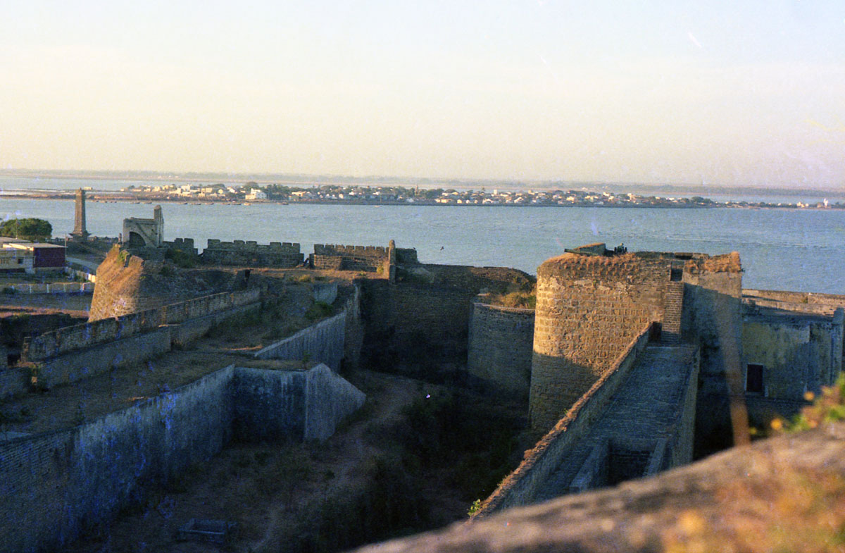 Diu Fort looking across the harbour entrance to Ghoghola, the mainland enclave of Diu in 1975.