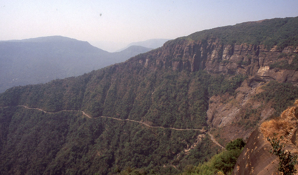 The road crossing the abrupt scarp which causes some of the heaviest rainfall in the world